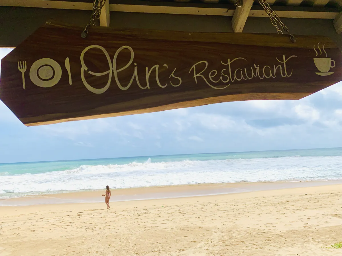 Olin's Beach Restaurant sign overlooking Narigama Beach
